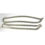 TWO 20TH CENTURY HEAVY GAUGE SILVER CURB LINK NECKLACE. (approx 49cm)