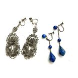 A PAIR OF EARLY 20TH CENTURY CONTINENTAL SILVER FILIGREE DROP EARRINGS The single rose design to