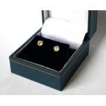 A MATCHED PAIR OF 18CT WHITE GOLD AND DIAMOND STUD EARRINGS Single round cut stones