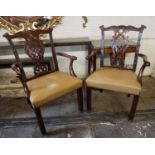 A PAIR OF CHIPPENDALE DESIGN MAHOGANY OPEN ARMCHAIRS With shaped and scroll back rail above a