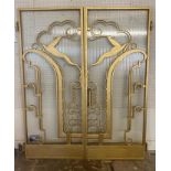 A PAIR OF STYLISH ART DECO PERIOD ACTEON DEER STEEL AND GLAZED DOORS, LATER GOLD PAINT. (each 83cm x