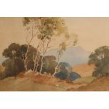 AN EARLY 20TH CENTURY WATERCOLOUR Landscape, indistinctly signed, mounted, framed and glazed. (