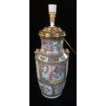 A 19TH CENTURY CHINESE CANTONESE VASE CONVERTED TO LAMP BASE With lion mask handles, decorated