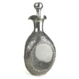 A CHINESE SILVER AND CLEAR GLASS DIMPLE DECANTER AND STOPPER. (27cm)