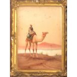 AN EARLY 20TH CENTURY WATERCOLOUR, Tribesmen on camel back, indistinctly signed, gilt framed. 43 x
