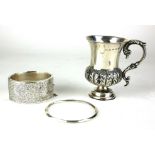 A VICTORIAN SILVER BALUSTER CHRISTENING MUG With acanthus leaf decoration, hallmarked George