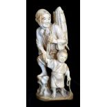 A JAPANESE MEJI PRIOD CARVED IVORY STATUE, FISHERWOMAN WITH CHILD Signed. (17.5cm)
