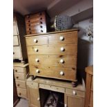 A VICTORIAN PINE CHEST Of two short above three long drawers fitted with white china handles, raised