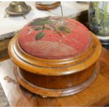 A VICTORIAN MAHOGANY AND BEADWORK FOOT STOOL Spherical form with hinged compartment and melon form