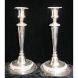 A PAIR OF EARLY 19TH CENTURY SHEFFIELD PLATE CANDLESTICKS Having gadrooned border and spherical