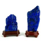 TWO LARGE CHINESE LAPIS LAZULI SCULPTURES Hand carved with pagoda in a mountainous landscape, on