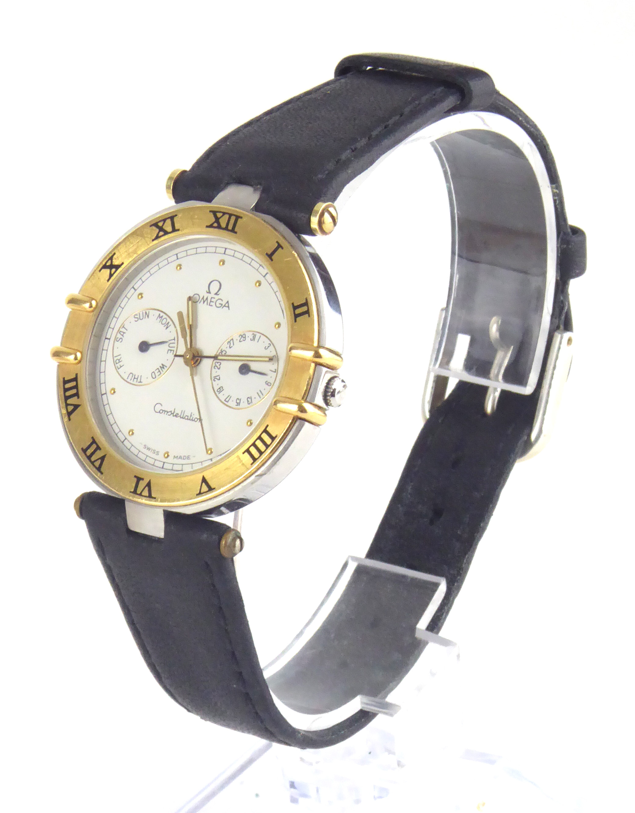 OMEGA, CONSTELLATION, DAY DATE 1444, AN 18CT GOLD AND STAINLESS STEEL GENT?S WRISTWATCH Having a