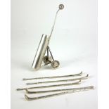 A 20TH CENTURY EGYPTIAN SILVER NOVELTY SILVER MINIATURE GOLD TROLLEY AND CLUBS Having a golf ball