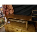 A VINTAGE ERCOL ASH AND ELM COFFEE TABLE , with turned wood under tier, on splayed legs 105 x 43 x