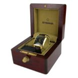 ETERNA-MATIC CENTENAIRE, A VINTAGE 18CT GOLD WATCH With square dial, calendar, automatic, brown