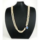 A CULTURED PEARL TWO STRAND NECKLACE.