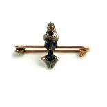 A LATE 19TH/EARLY 20TH CENTURY 9CT GOLD AND SILVER ENAMELLED BLACKAMOOR BROOCH The turban set with