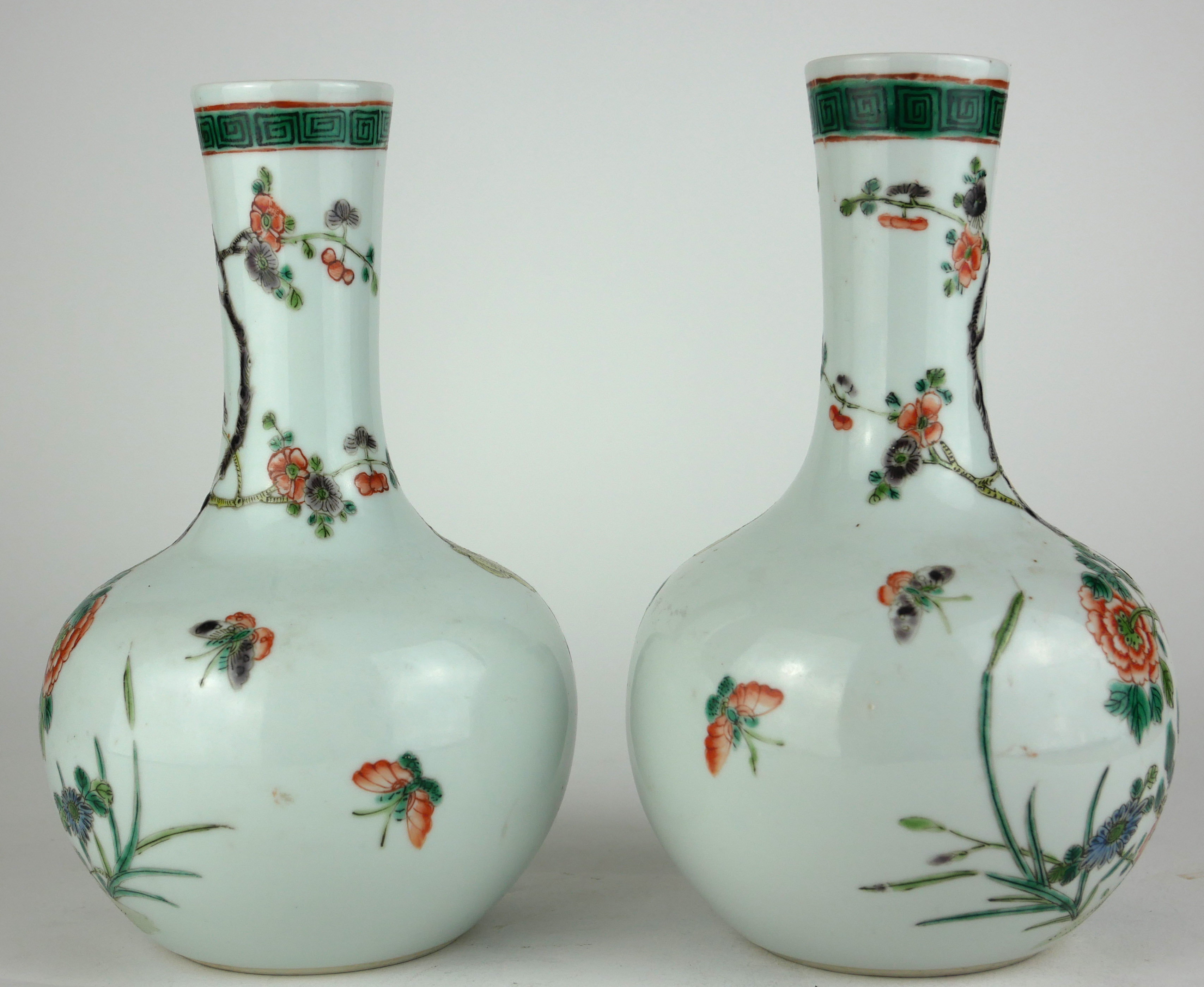 A PAIR OF 19TH CENTURY CHINESE VASES With enamelled decoration in the form of exotic birds amongst - Image 2 of 3