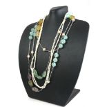 A SILVER, GEMSTONE AND PEARL SET NECKLACE Light green stones, together with a rice pearl