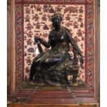 OMPHALE, QUEEN OF LYDIA SEATED ON LION SKIN, A RARE 19TH CENTURY BRONZE STATUE On a stepped rouge