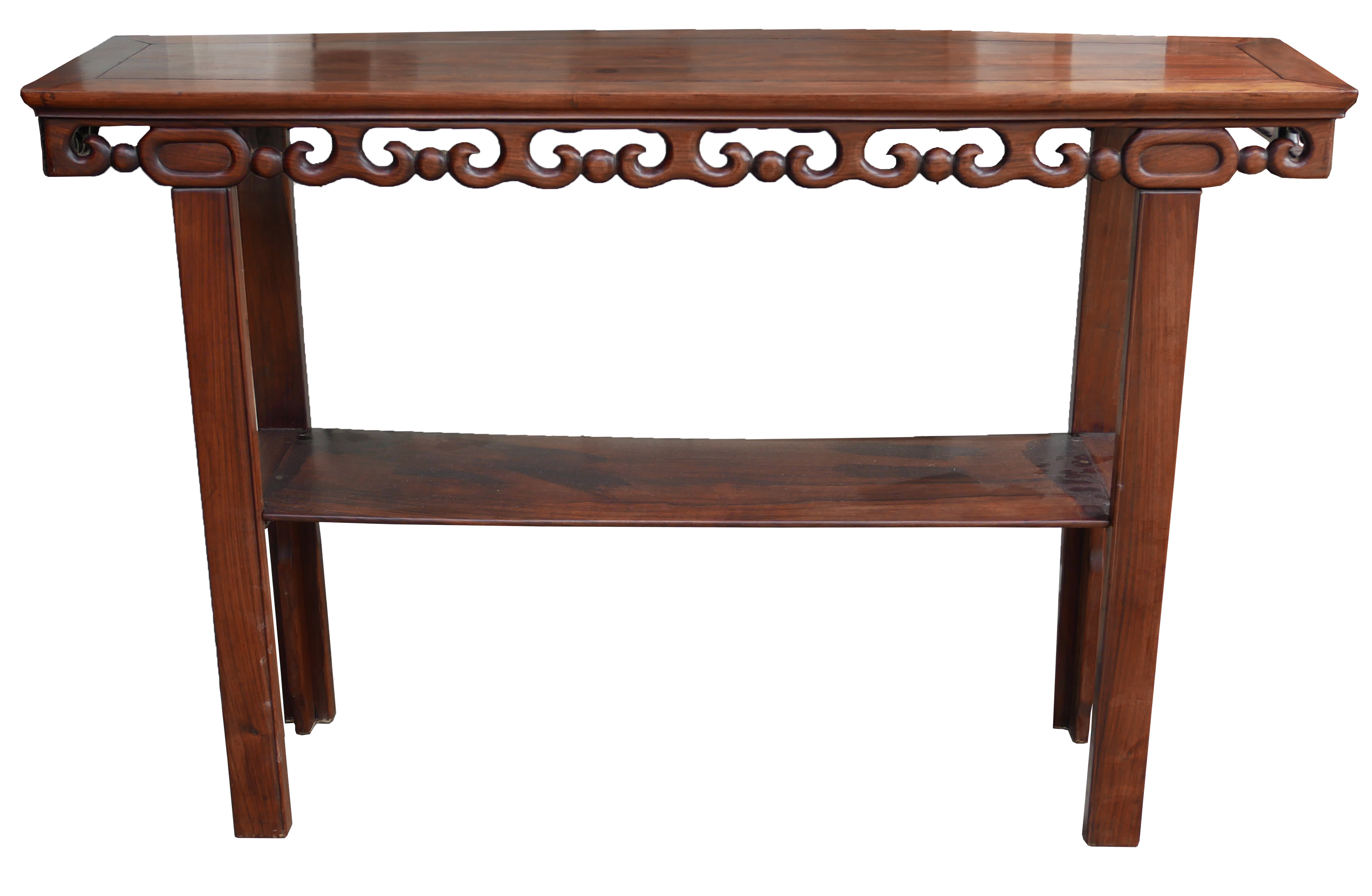A LARGE 19TH CENTURY CHINESE HARDWOOD TWO TIER ALTAR TABLE With singe plank top over carve frieze,