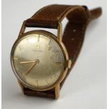 HAMILTON, A 9CT GOLD WATCH On leather strap, unmarked.