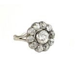 A VICTORIAN 18CT GOLD AND OLD CUT DIAMOND DAISY CLUSTER RING. (colour H) (clarity SI)