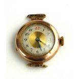 AN EARLY 20TH CENTURY 9CT GOLD RED 12 WATCH No strap.