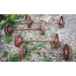 A SET OF FOUR HEAVY STEEL RAILWAY WHEELS. (l 110cm)