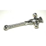 A CONTINENTAL WHITE METAL NOVELTY 'MONKEY' CHILD'S RATTLE Standing pose with two bells and