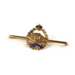 A 20TH CENTURY 9CT GOLD BRITISH ARMY SWEETHEART BROOCH Featuring a Drednaught tank. (approx 3cm)