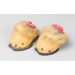 A LATE 19TH/EARLY 20TH CENTURY PAIR OF TINY PONY HOOF PIN CUSHIONS The largest (h 6cm x w 8.5cm x