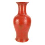 A CHINESE CORAL GLAZE PORCELAIN BALUSTER VASE With gilt decoration. (approx 41cm)