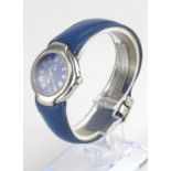 DUNHILL, A VINTAGE STAINLESS STEEL LADIES' WRISTWATCH Having a circular blue tone dial with calendar