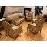 A CONTINENTAL FIVE PIECE SALON SUITE With parcel gilt and painted fame in a burnished gold and