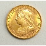 A QUEEN VICTORIA 22CT GOLD SOVEREIGN COIN, DATED 1899 With George and Dragon to reverse.