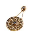 AN EDWARDIAN 15CT GOLD, SAPPHIRE AND SEED PEARL PENDANT Set with two round cut sapphires in