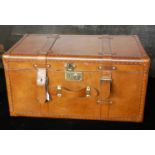 A TAN LEATHER TRUNK Applied with straps and brass fittings. (65cm x 35.5cm x 31cm) Condition: good