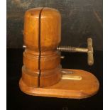 A VICTORIAN/EDWARDIAN TREEN SHOP'S HAT STRETCHER With iron tooling.