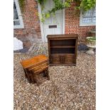 A JACOBEAN STYLE OAK OPEN BOOKCASE With carved cupboards below, along with a nest of three