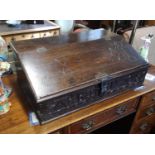 AN EARLY 18TH CENTURY OAK BIBLE BOX With carved decoration and bearing the initials 'AB 1708'. (68cm