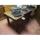 A 19TH CENTURY WAXED PINE WORK BENCH/TABLE With 5cm plank top wooden vice, on square legs. (125cm