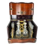 A 19TH CENTURY FRENCH ROSEWOOD, BRASS AND GLASS DECANTER BOX The hinged lid having brass