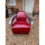 AN ART DECO DESIGN POLISHED ALUMINIUM AND RED LEATHER UPHOLSTERED AVIATION OPEN ARMCHAIR. (73cm x