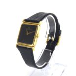 JAEGER-LECOULTRE, AN 18CT GOLD GENT'S WRISTWATCH Having a square black tone dial with gilt hands