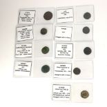 A COLLECTION OF TWELVE ROMAN BRONZE COINS Various Emperors, together with two Roman silver coins