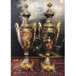 A LARGE PAIR OF SÈVRES STYLE FLOOR STANDING VASES AND COVERS With gilt bronze mounts and decorated