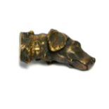 A BRASS NOVELTY DOG FORM VESTA CASE Hunting dog with hinged compartment and strike base. (approx