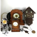 A 19TH CENTURY FRENCH OAK INLAID MANTEL CLOCK Having a brass carry handle and classical form