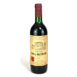 HAUT MEDOC 1985, CHÂTEAU TOUR DU HAUT-MOULIN CRU BOURGEOIS, A VINTAGE CREAM LABEL BOTTLE OF RED